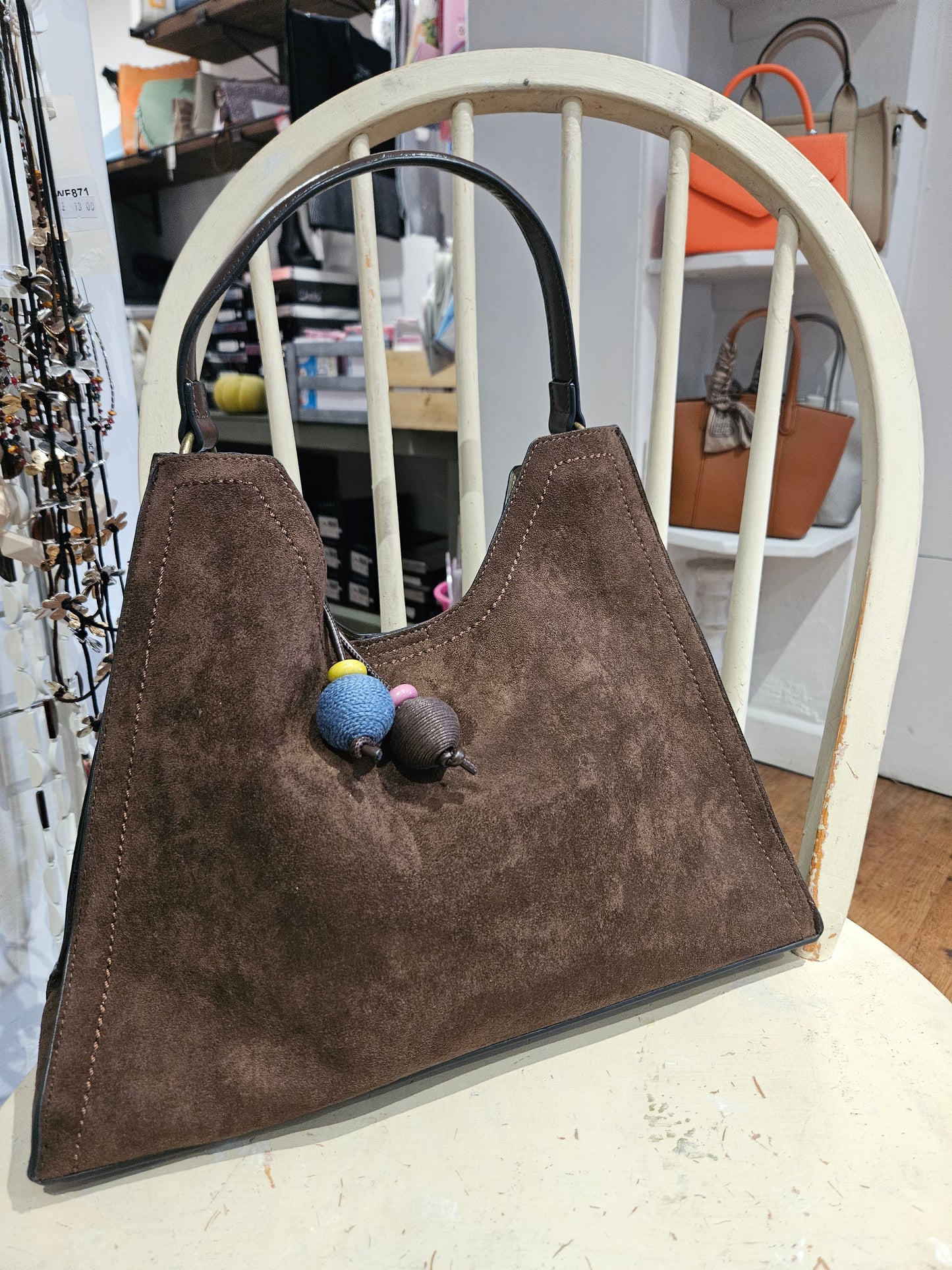 Suede Handbag With Decorative Charm