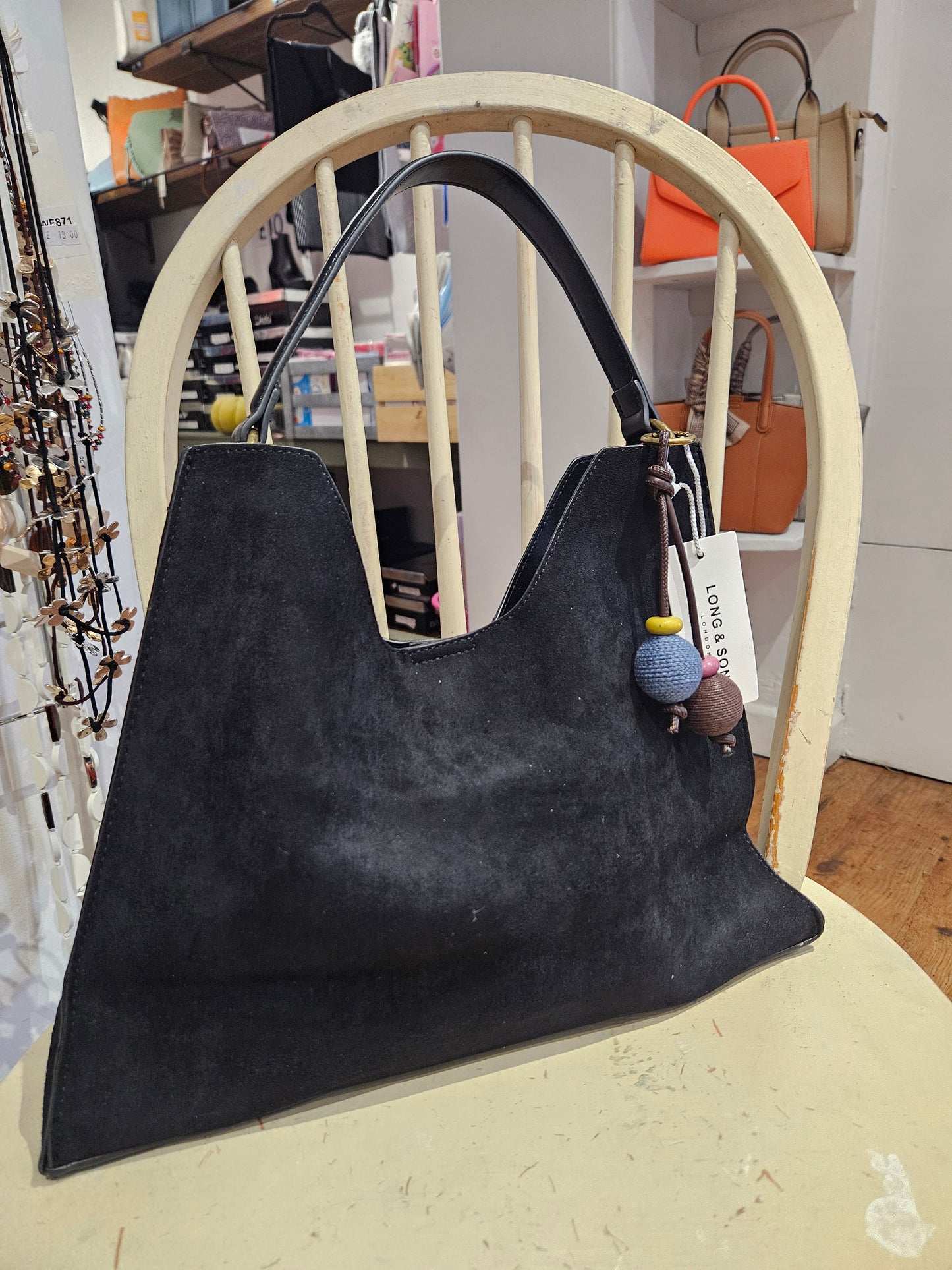 Suede Handbag With Decorative Charm