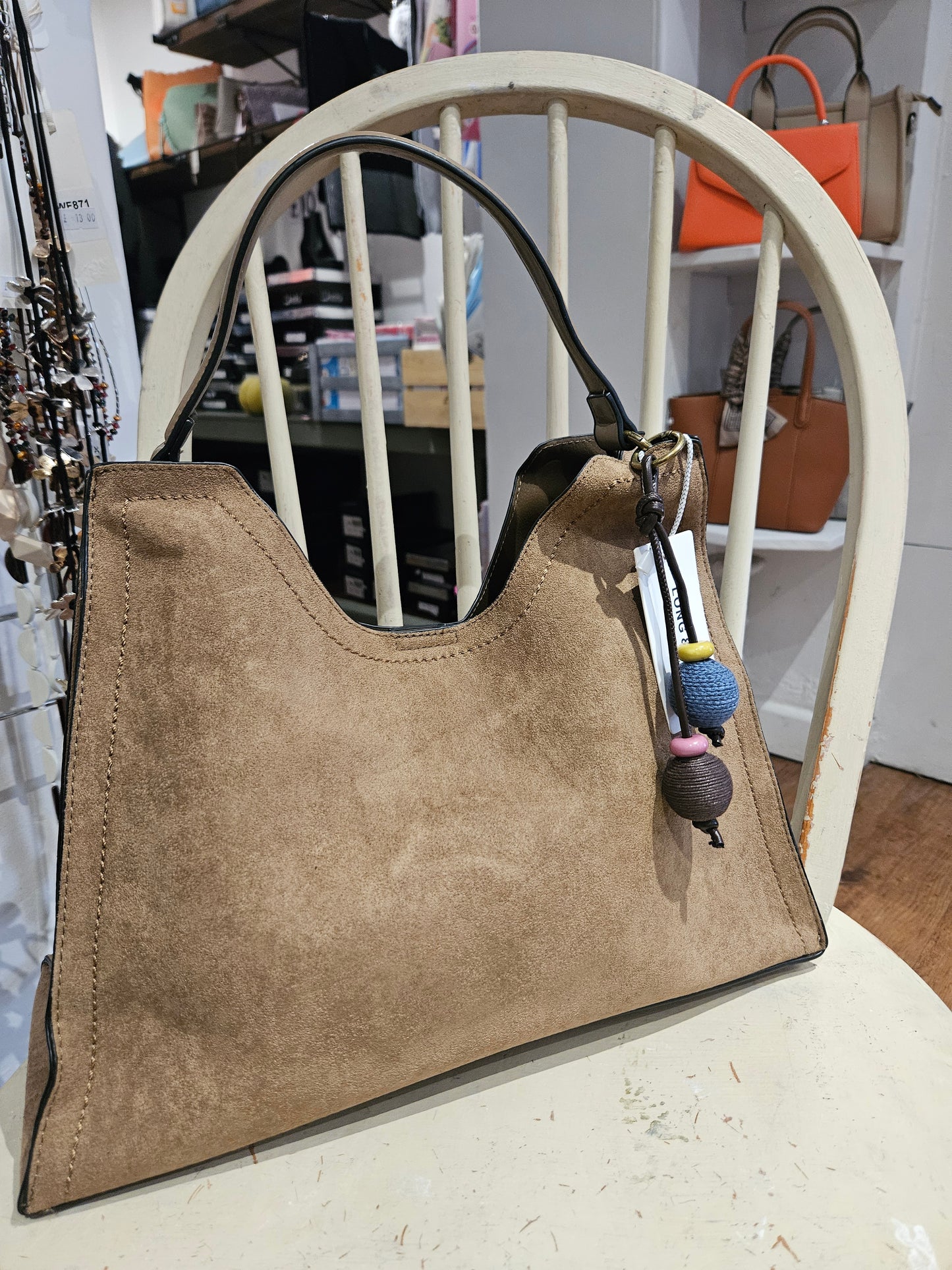 Suede Handbag With Decorative Charm
