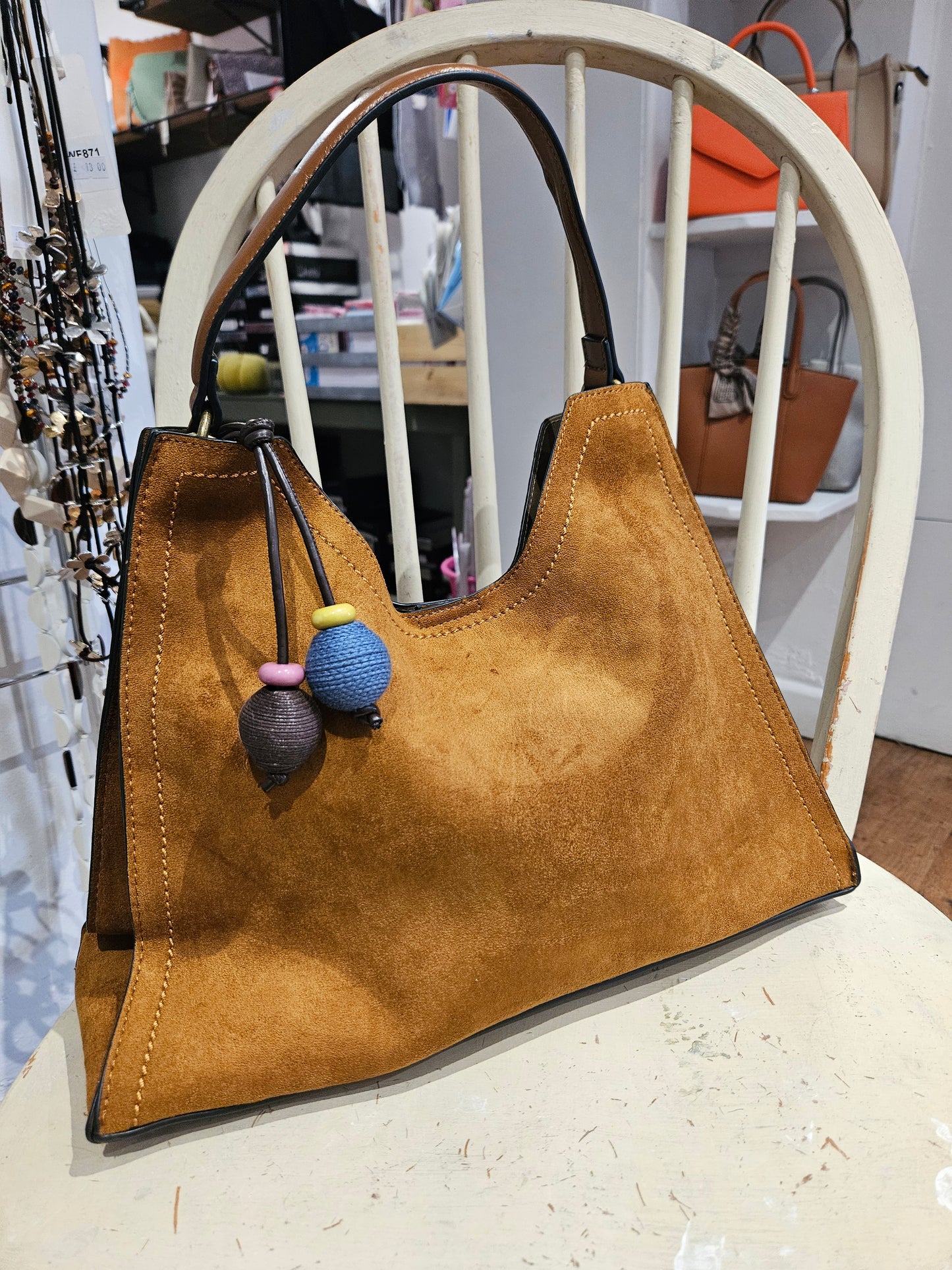 Suede Handbag With Decorative Charm