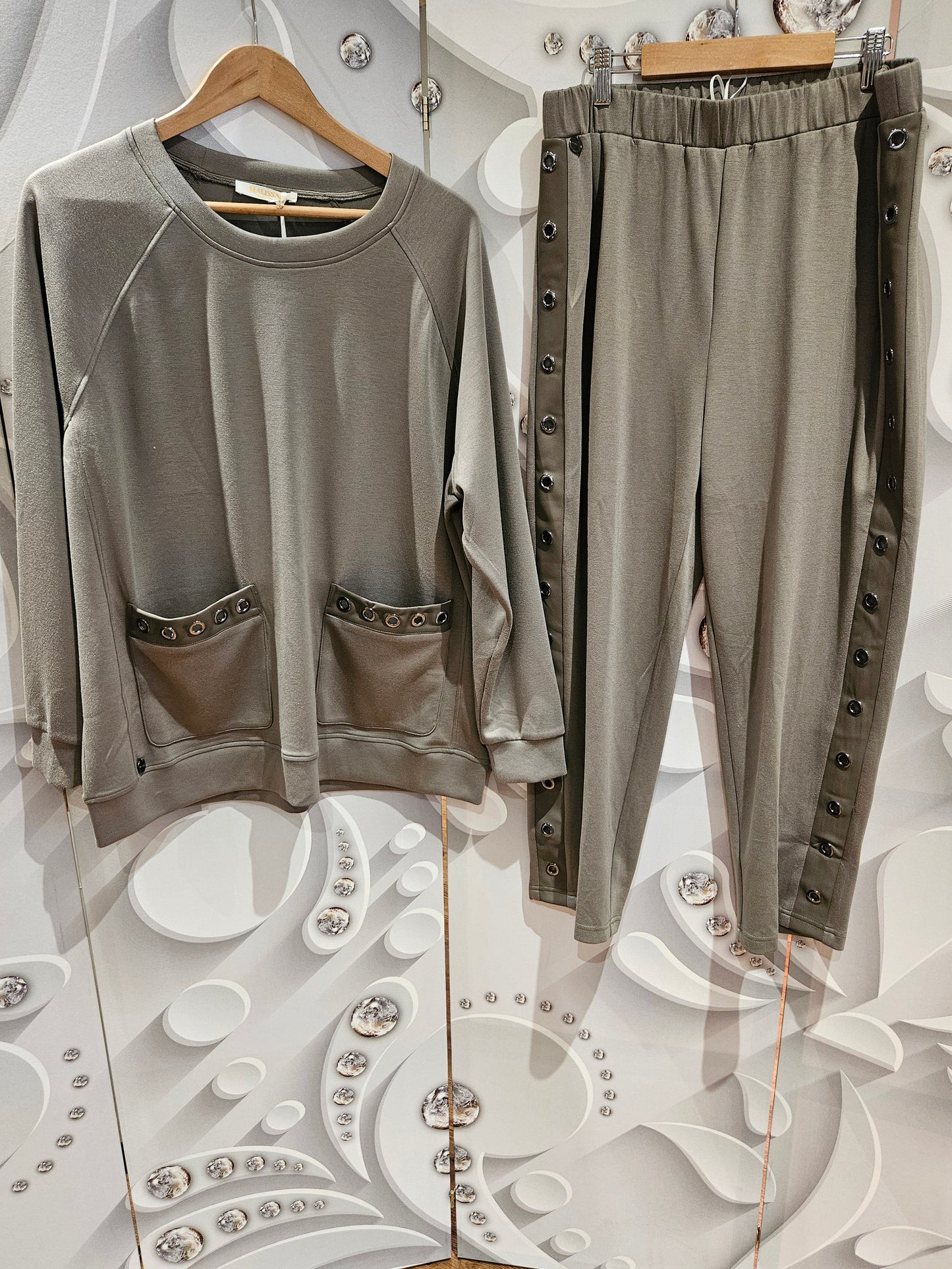 Top with Eyelet Pocket Detail