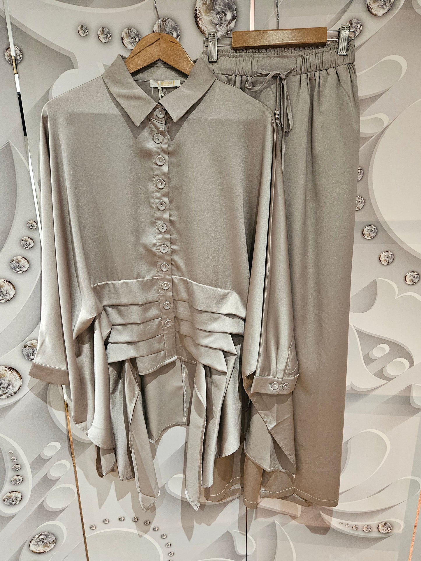 Oversized Blouse With Layered Hemline