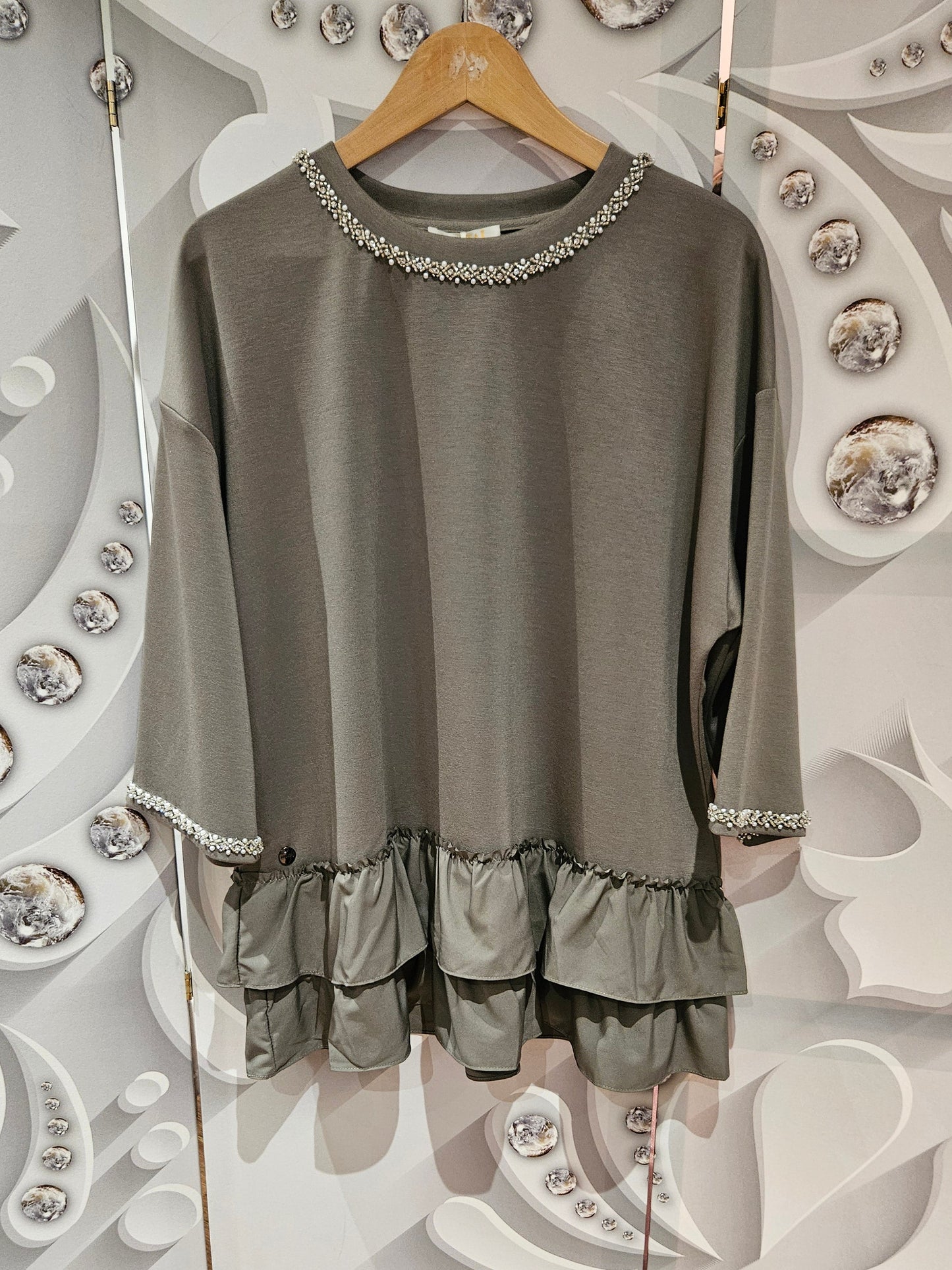 Tiered Hemline Top with Embellishment Detail